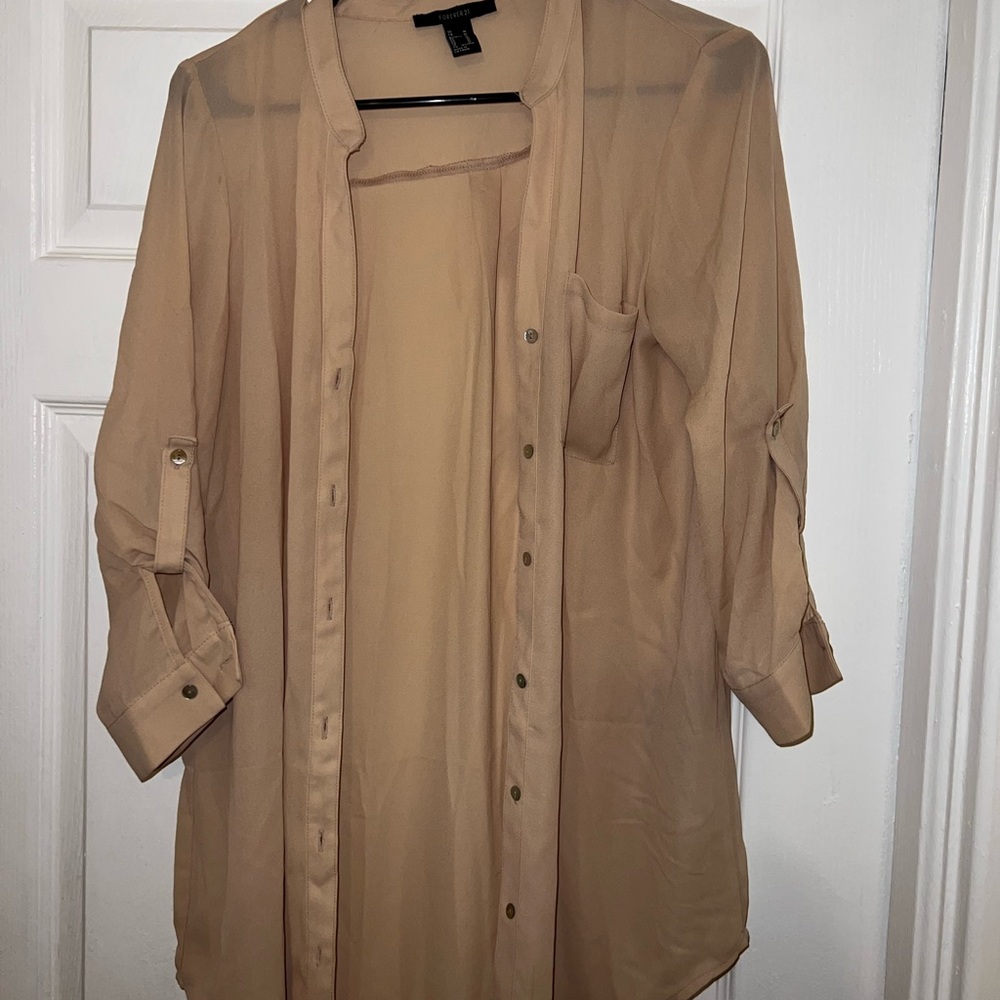 Beige Long sleeve button down blouse. Size medium. Worn once.